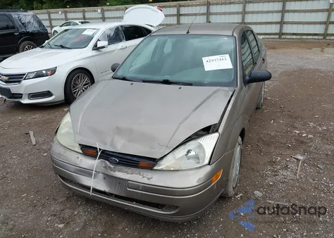 2003 Ford Focus Lx z USA, uszkodzony, nr VIN 1FAFP33PX3W167800
